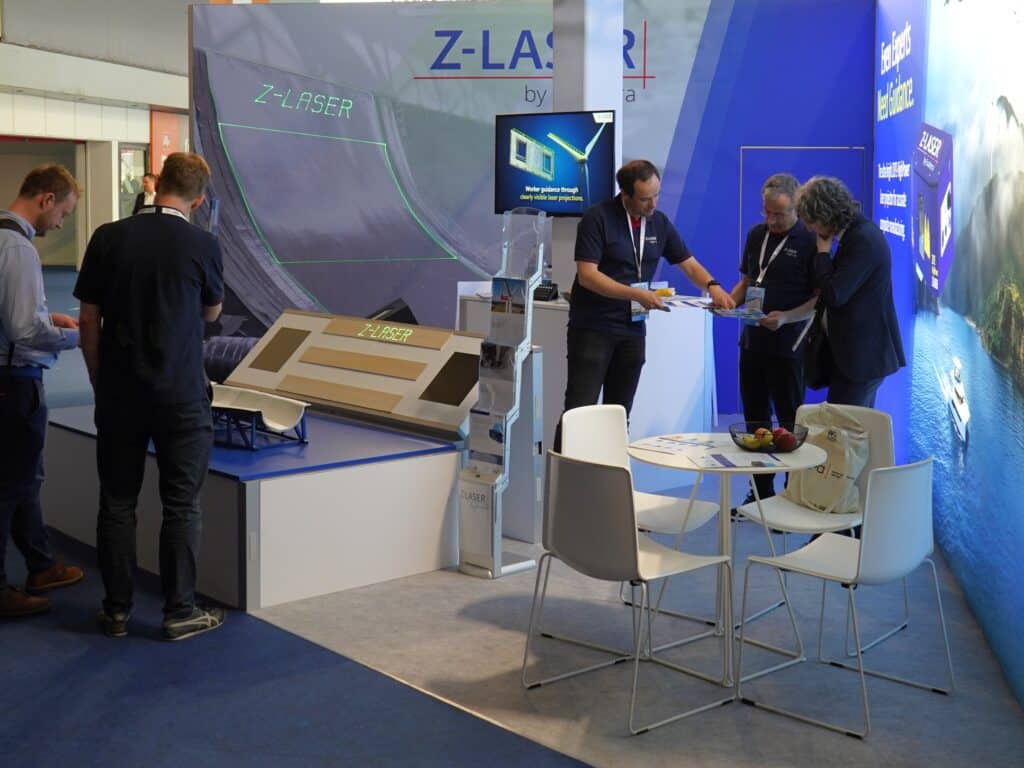 Z-LASER booth at JEC World 2026 demonstrating laser projection for precise positioning in composite manufacturing