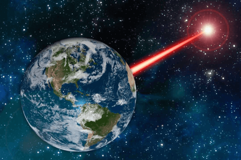 A rendering of a laser beacon beaming from Earth. Massachusetts Institute of Technology